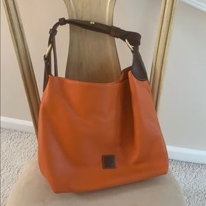 Dooney & Bourke orange and brown leather bag